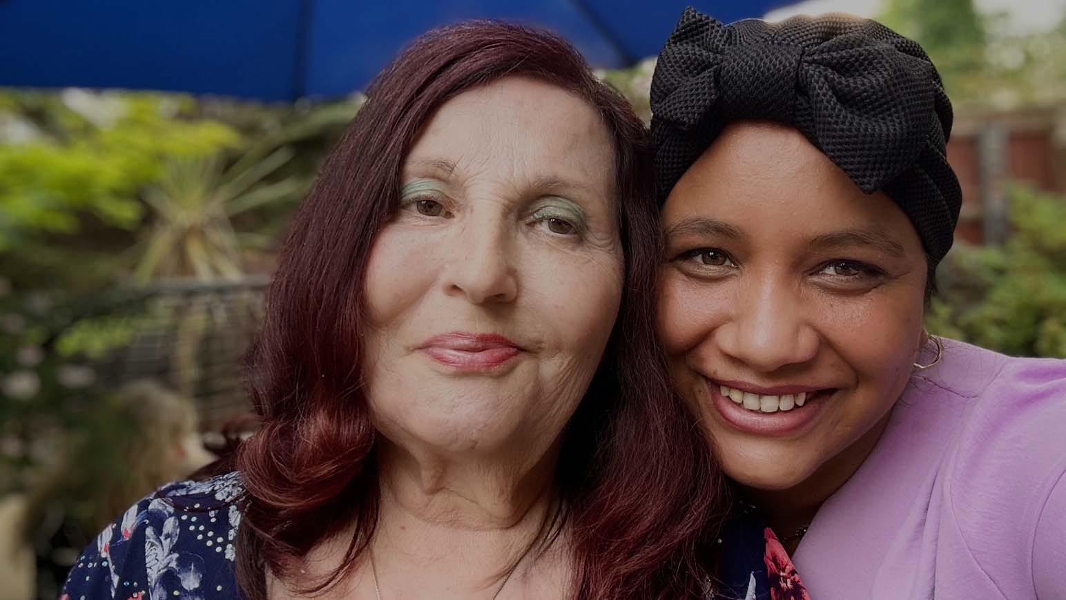 Headshot of Sheila and Dela smiling