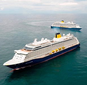 Aerial view of two cruise ships, including Discovery of Adventure