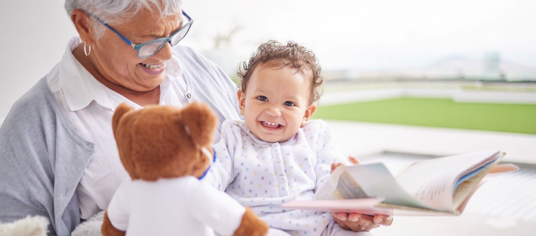 man lying on the floor with granddaughter